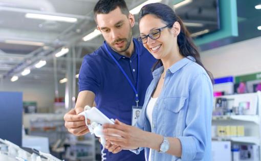 sales person explaining rebate to customer